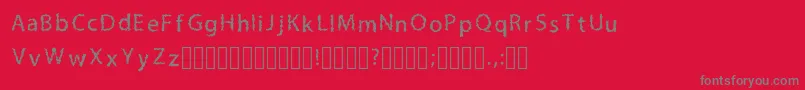 Fonte LilmessyRegular – fontes cinzas em um fundo vermelho