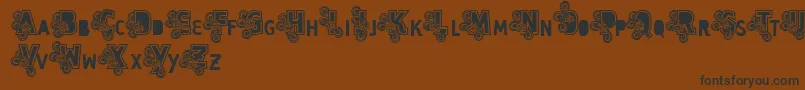 Vtks Caps Loco Font – Black Fonts on Brown Background