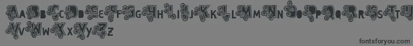 Vtks Caps Loco-Schriftart – Schwarze Schriften auf grauem Hintergrund