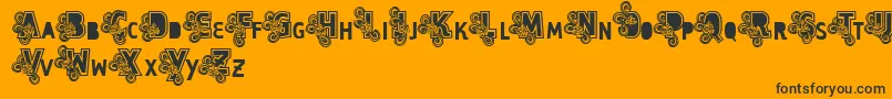 Шрифт Vtks Caps Loco – чёрные шрифты на оранжевом фоне