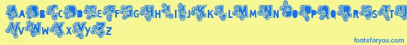 Шрифт Vtks Caps Loco – синие шрифты на жёлтом фоне