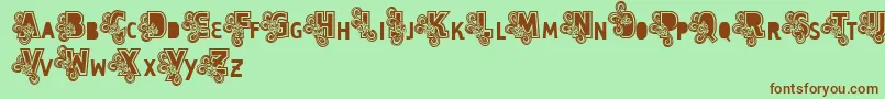 Vtks Caps Loco-Schriftart – Braune Schriften auf grünem Hintergrund