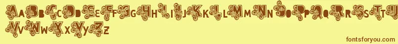 Vtks Caps Loco-Schriftart – Braune Schriften auf gelbem Hintergrund