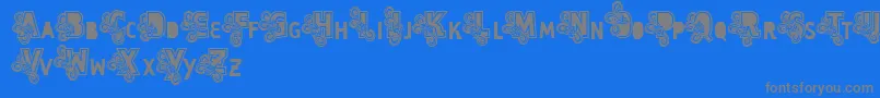 Vtks Caps Loco Font – Gray Fonts on Blue Background