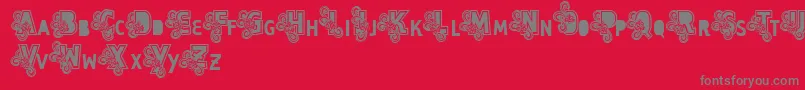 Vtks Caps Loco-Schriftart – Graue Schriften auf rotem Hintergrund