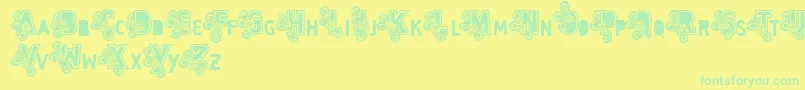 Шрифт Vtks Caps Loco – зелёные шрифты на жёлтом фоне