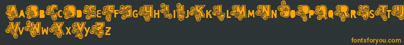 Vtks Caps Loco Font – Orange Fonts on Black Background