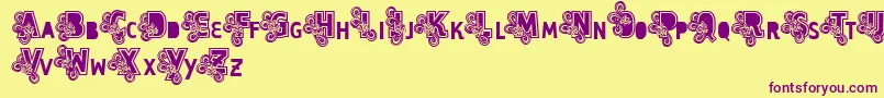 Vtks Caps Loco Font – Purple Fonts on Yellow Background