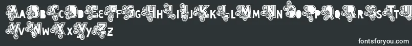 Шрифт Vtks Caps Loco – белые шрифты на чёрном фоне