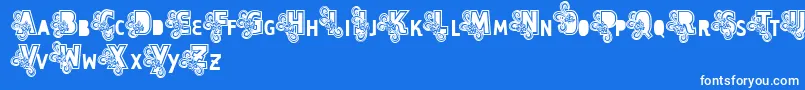 Шрифт Vtks Caps Loco – белые шрифты на синем фоне