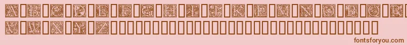 GoudyInitialen-fontti – ruskeat fontit vaaleanpunaisella taustalla