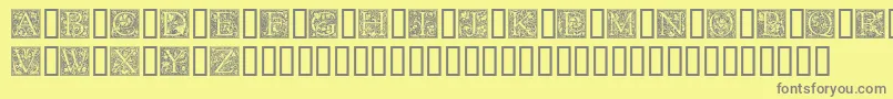 フォントGoudyInitialen – 黄色の背景に灰色の文字