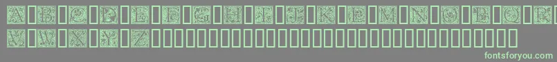 GoudyInitialen-fontti – vihreät fontit harmaalla taustalla