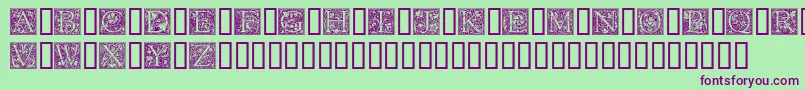 フォントGoudyInitialen – 緑の背景に紫のフォント