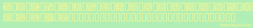 Шрифт GoudyInitialen – жёлтые шрифты на зелёном фоне