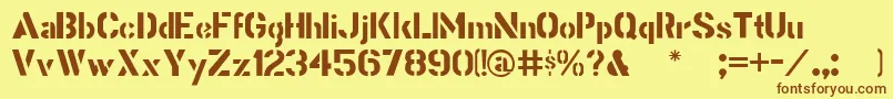 Stencilgothic Font – Brown Fonts on Yellow Background