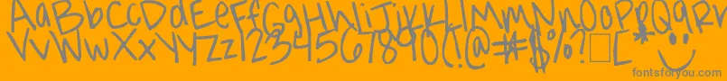 Jorgieporgiepuddinpie-Schriftart – Graue Schriften auf orangefarbenem Hintergrund