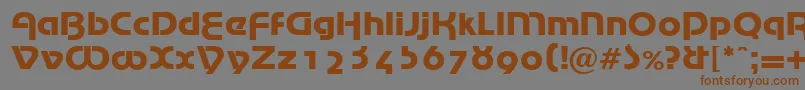 フォントMarinaRegularDb – 茶色の文字が灰色の背景にあります。