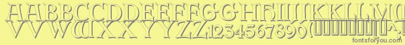 ErbarinitialenShadow Font – Gray Fonts on Yellow Background