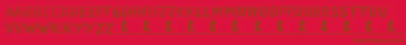 Snowmania Font – Brown Fonts on Red Background