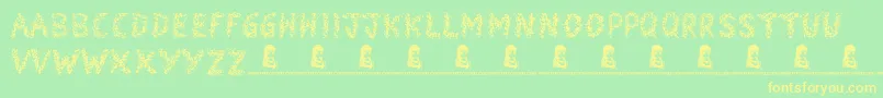 Snowmania Font – Yellow Fonts on Green Background