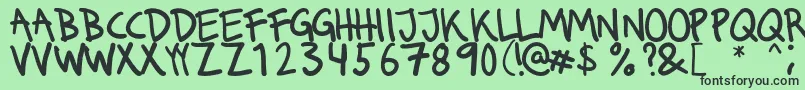 Runkmuskel Font – Black Fonts on Green Background