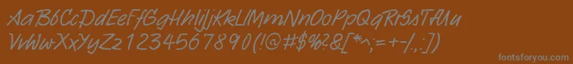 Czcionka HwSarxDb – szare czcionki na brązowym tle