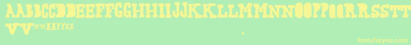 FreakingStrange Font – Yellow Fonts on Green Background