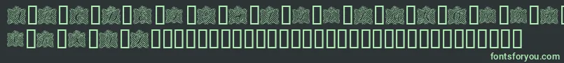 フォントRibbonCaps – 黒い背景に緑の文字