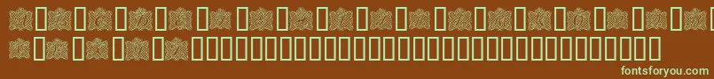 フォントRibbonCaps – 緑色の文字が茶色の背景にあります。