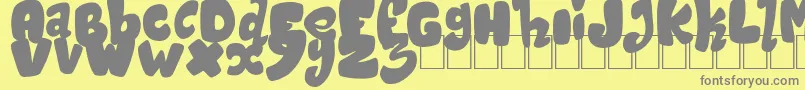 フォントMagicSound – 黄色の背景に灰色の文字