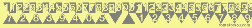 DeconumbersLhTriangle Font – Gray Fonts on Yellow Background