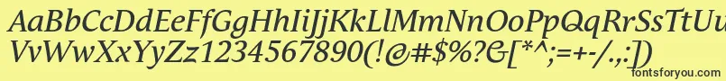 AndulkaTextProItalic Font – Black Fonts on Yellow Background