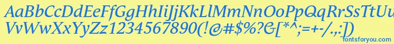 AndulkaTextProItalic Font – Blue Fonts on Yellow Background