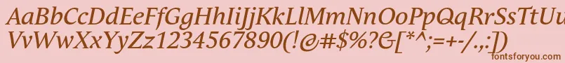 Шрифт AndulkaTextProItalic – коричневые шрифты на розовом фоне