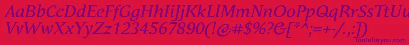 AndulkaTextProItalic-Schriftart – Violette Schriften auf rotem Hintergrund