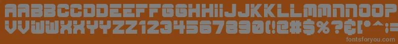 EspBold-fontti – harmaat kirjasimet ruskealla taustalla