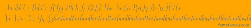 Czcionka HoniladScriptDemo – szare czcionki na pomarańczowym tle