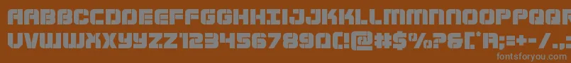 Supersubmarine-fontti – harmaat kirjasimet ruskealla taustalla