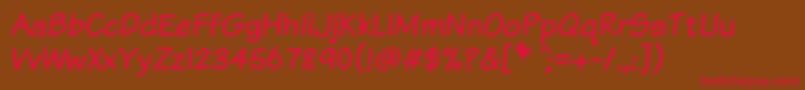 フォントKomtxt – 赤い文字が茶色の背景にあります。