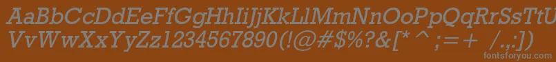 RodeocItalic-fontti – harmaat kirjasimet ruskealla taustalla