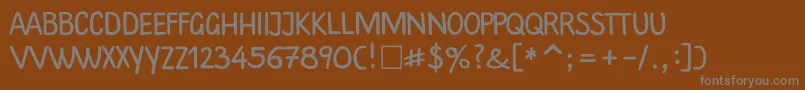 Plainscriptctt Font – Gray Fonts on Brown Background