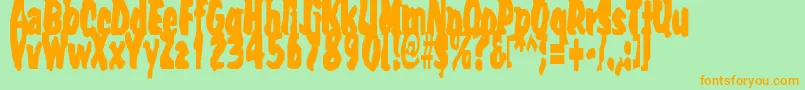 Umpyre Font – Orange Fonts on Green Background