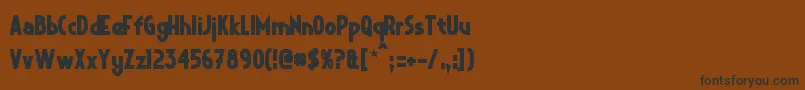 CrystalDecoBold Font – Black Fonts on Brown Background