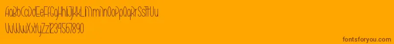 MarikoChanThin-Schriftart – Braune Schriften auf orangefarbenem Hintergrund