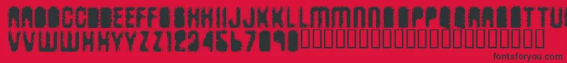 Fonte Antkiller – fontes pretas em um fundo vermelho