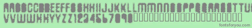 Antkiller Font – Gray Fonts on Green Background