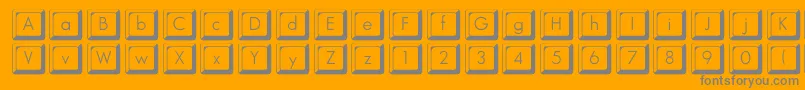 Keycapsflf-Schriftart – Graue Schriften auf orangefarbenem Hintergrund