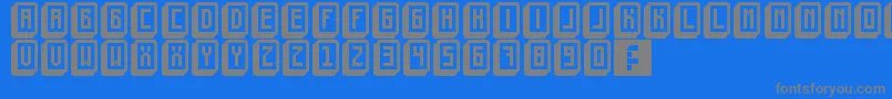 Fonte MahjongToyBlock – fontes cinzas em um fundo azul