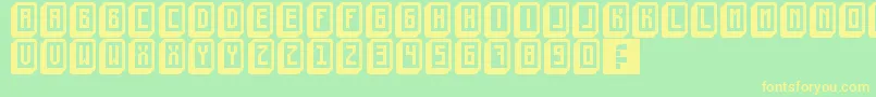 MahjongToyBlock-Schriftart – Gelbe Schriften auf grünem Hintergrund